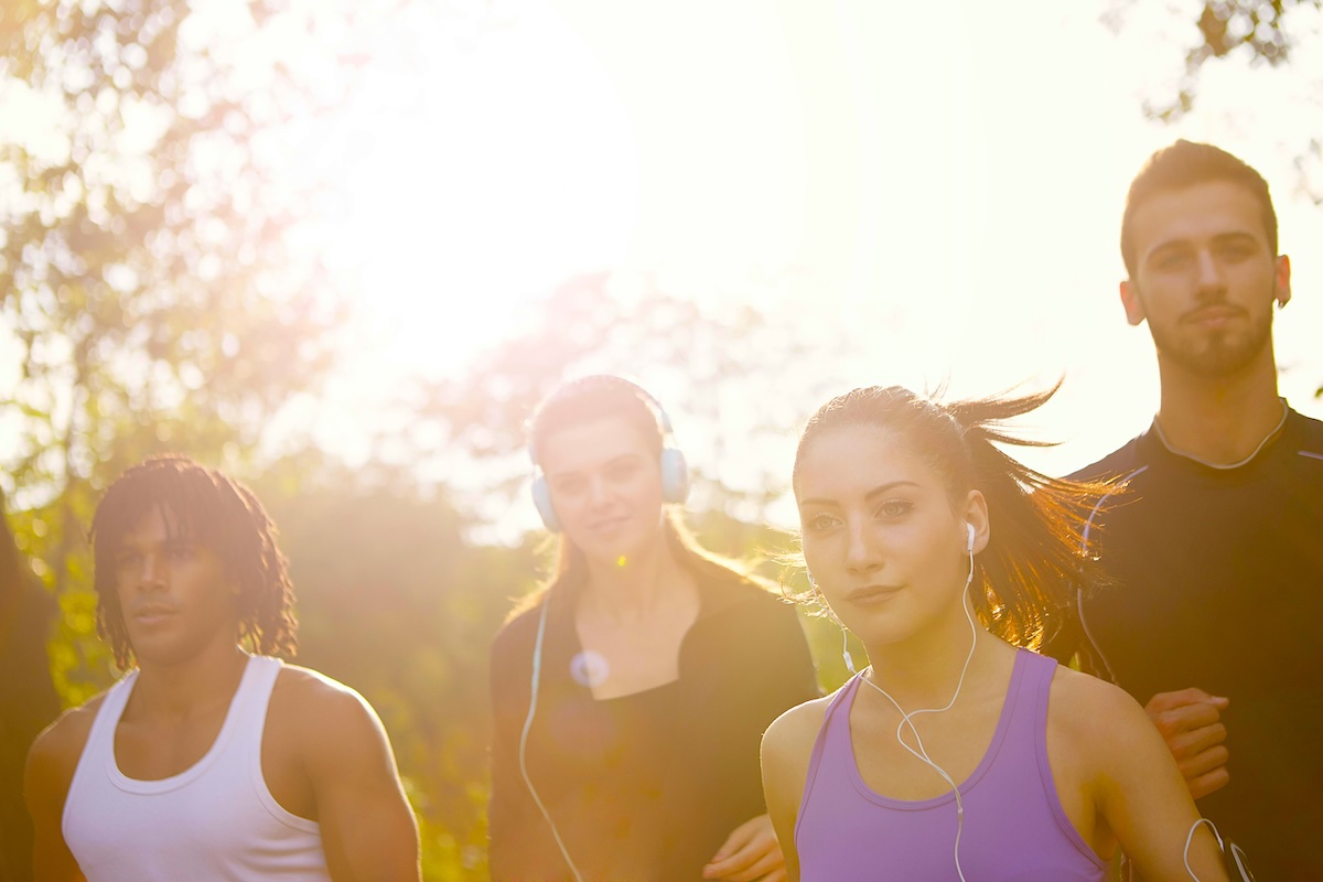 Running team celebrating fitness achievements